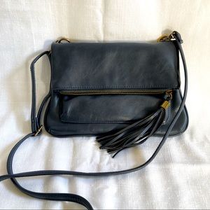 Navy blue crossbody gold-over purse with fringe tassel